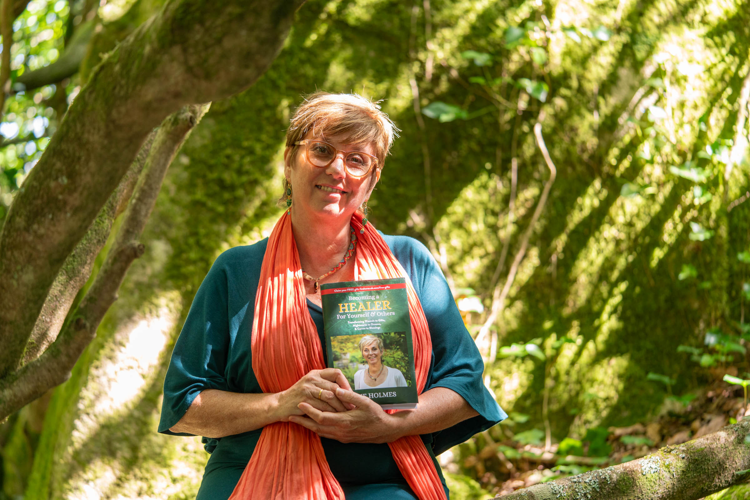 Shaman Sue Holmes completing a session, smiling into the distance