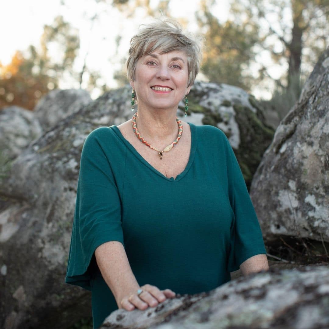 Sue Holmes Fire Horse (6) Sue Holmes completing a healing session with someone lay down next to her
